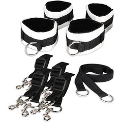  Две пары черно-белых кружевных наручников, крепящиеся к матрасу 