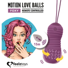  Фиолетовые вагинальные шарики с вращением бусин Remote Controlled Motion Love Balls Foxy 