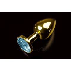  Маленькая золотистая анальная пробка с круглым кончиком и голубым кристаллом 7 см 