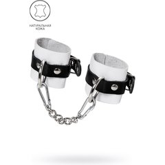  Бело-черные кожаные наручники с одним ремешком с люверсами 