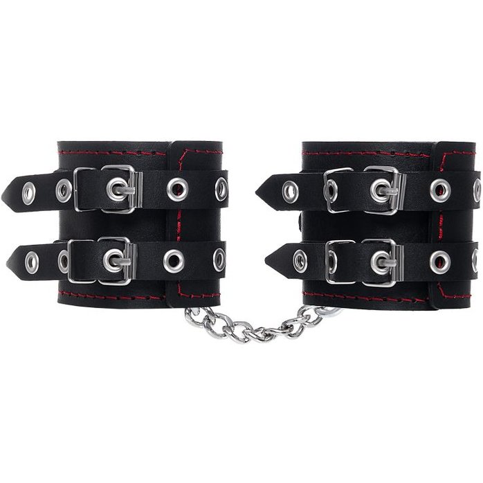 Черные кожаные наручники с двумя ремнями и подкладкой. Фотография 3.