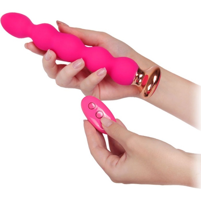 Розовый вибратор-ёлочка Mini Vibrator с пультом ДУ - 19 см. Фотография 4.