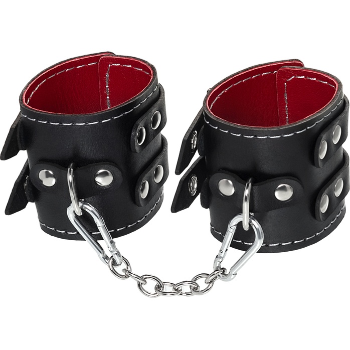 Черные кожаные наручники с двумя ремнями и красной подкладкой. Фотография 3.