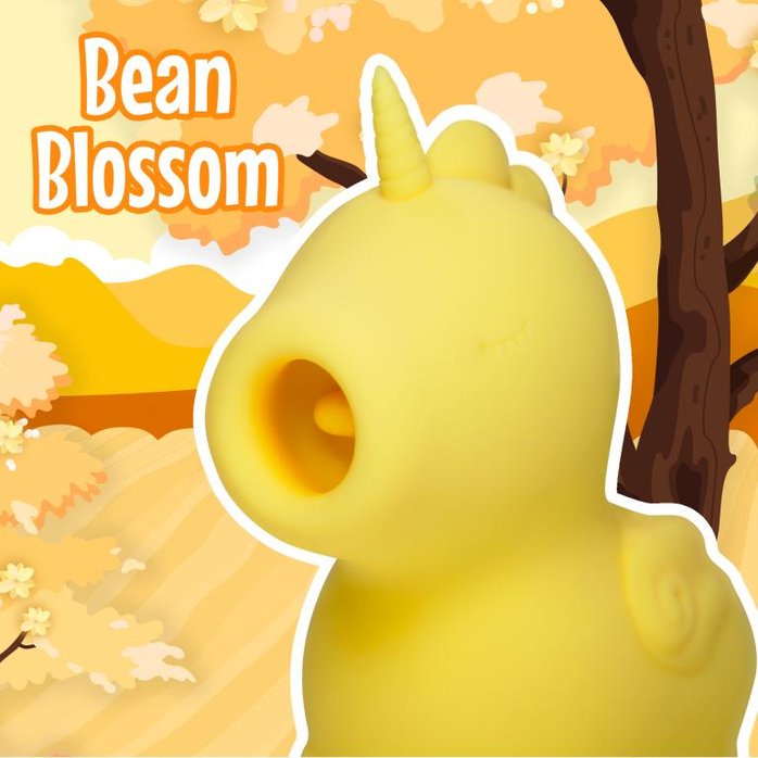 Желтый клиторальный вибромассажер Unihorn Bean Blossom с подвижным язычком. Фотография 6.