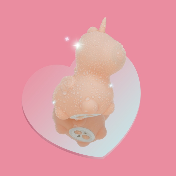 Персиковый клиторальный стимулятор Unihorn Heart Throb с режимом пульсации. Фотография 8.