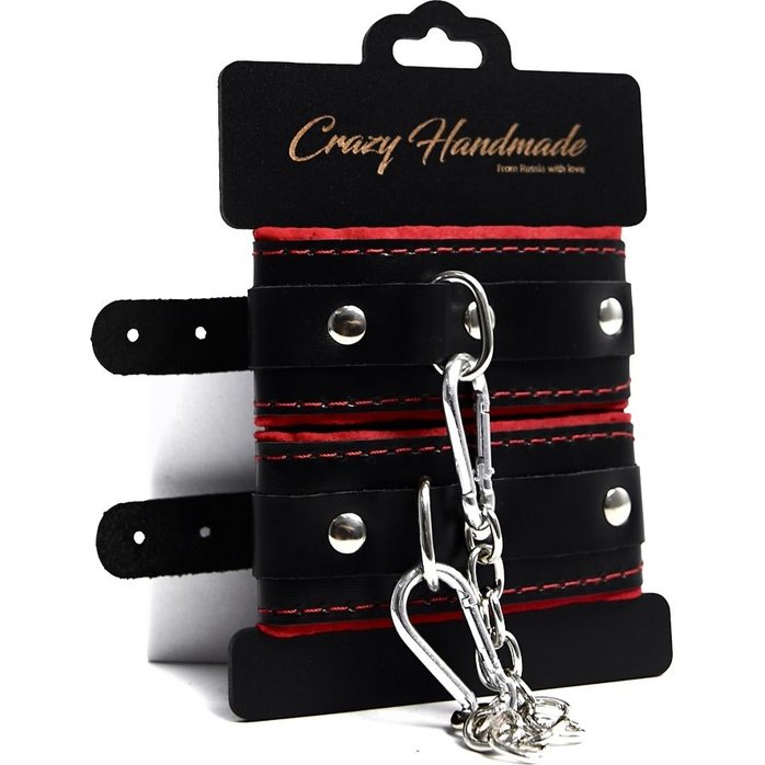 Черные наручники с красной подкладкой, строчками и скругленными ремешками. Фотография 2.