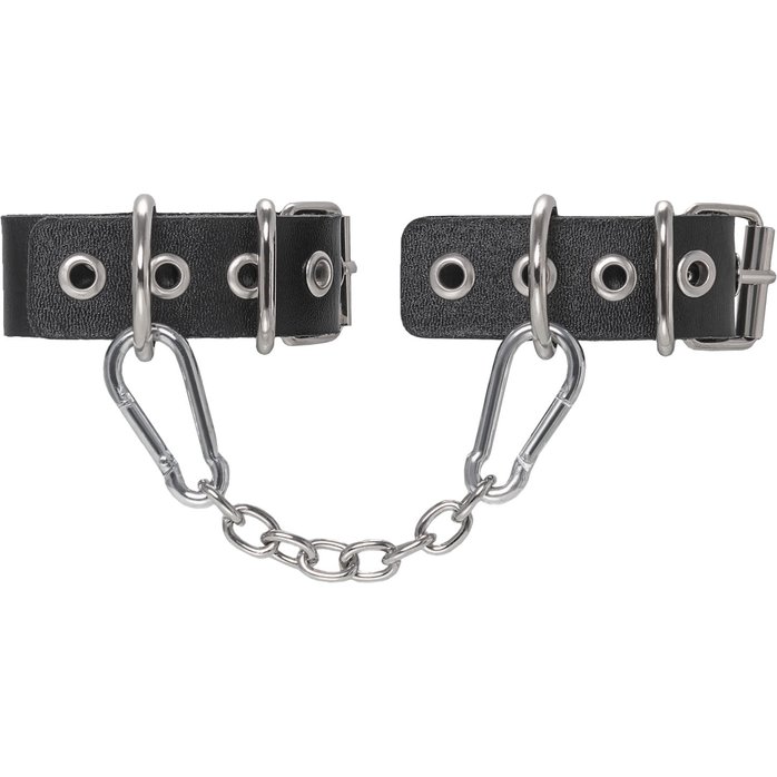 Черные кожаные наручники-браслеты из одного ремешка с люверсами. Фотография 2.