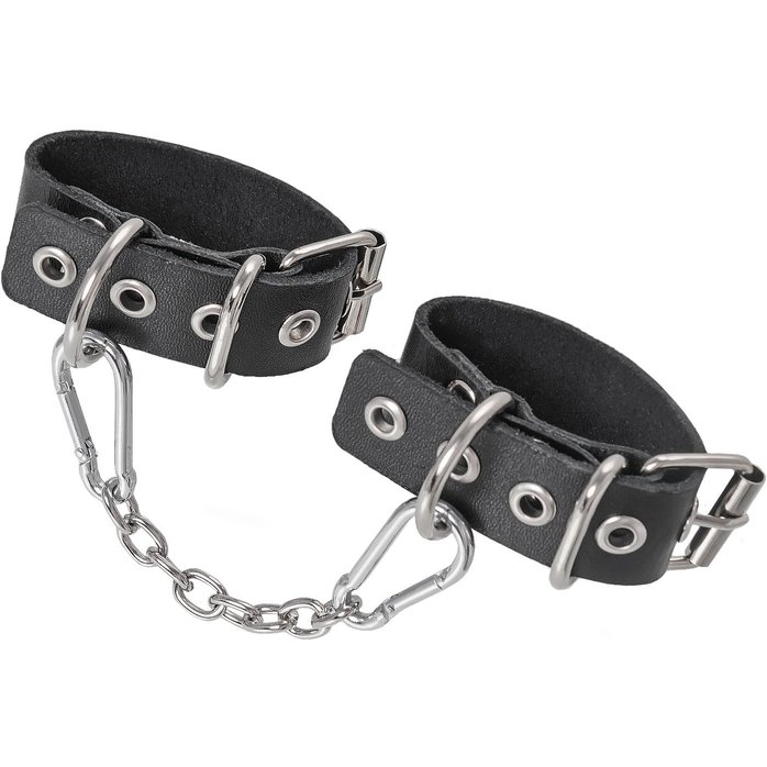 Черные кожаные наручники-браслеты из одного ремешка с люверсами. Фотография 4.