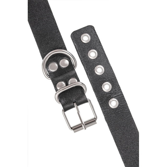 Черные кожаные наручники-браслеты из одного ремешка с люверсами. Фотография 8.