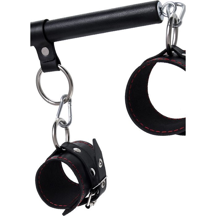 Черная распорка с 4 манжетами для рук и ног. Фотография 6.