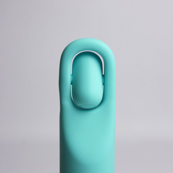 Бирюзовая многофункциональная вибропуля с щеточкой. Фотография 6.