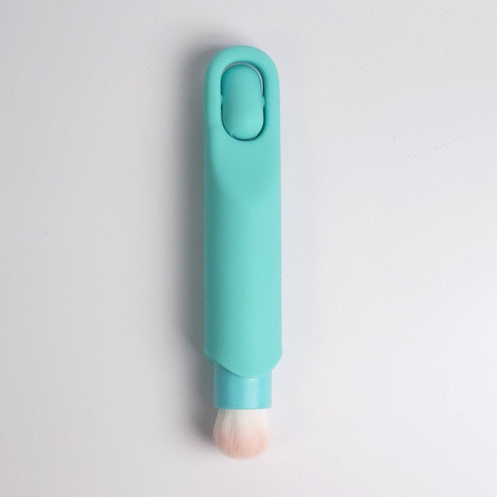 Бирюзовая многофункциональная вибропуля с щеточкой. Фотография 9.