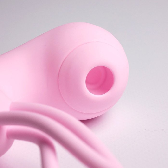 Розовый вакуумный стимулятор клитора с вагинальными виброшариками. Фотография 5.