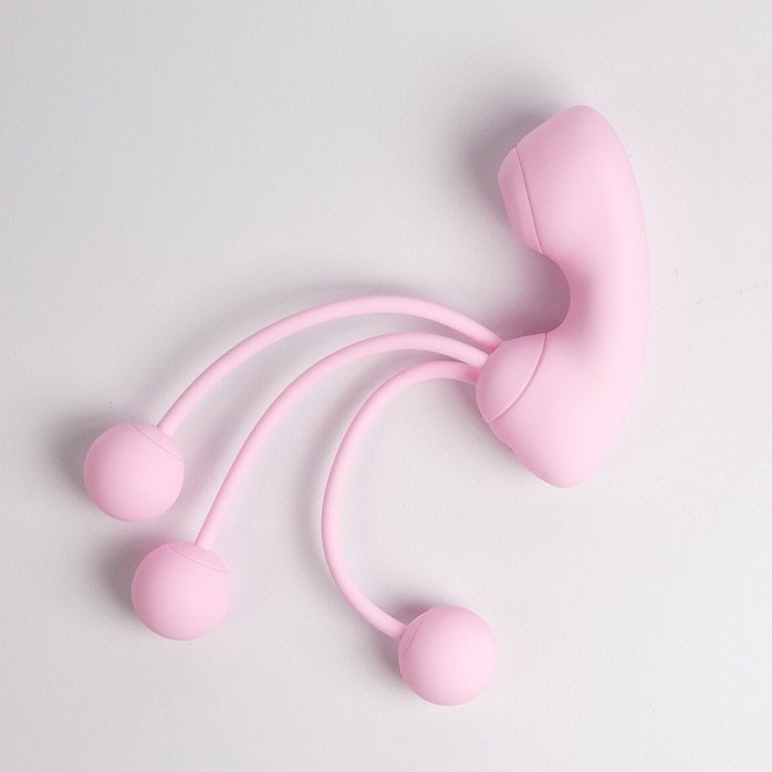 Розовый вакуумный стимулятор клитора с вагинальными виброшариками. Фотография 6.