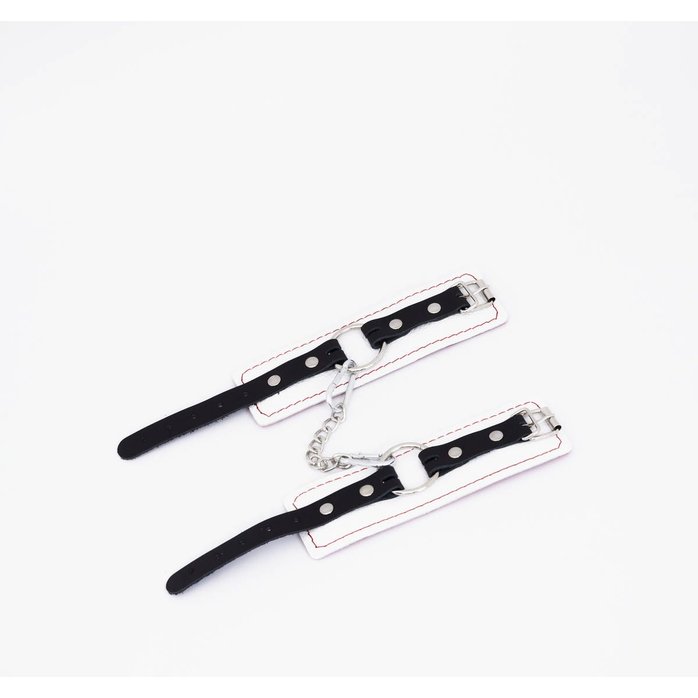 Бело-красные кожаные наручники. Фотография 2.