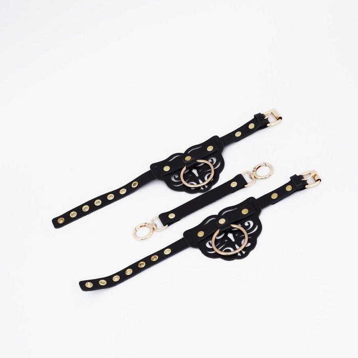 Черные оковы с золотистой фурнитурой. Фотография 2.