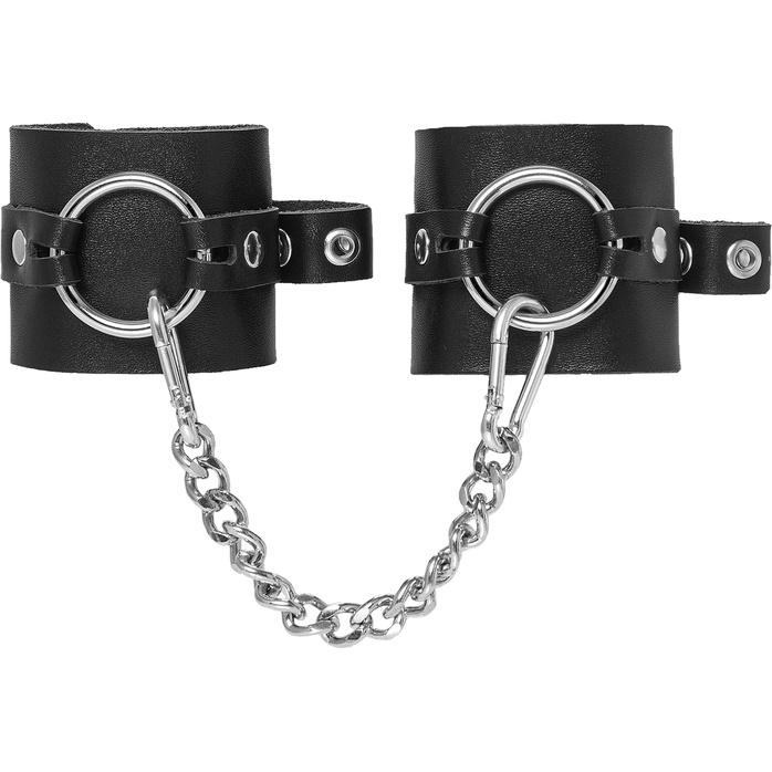 Черные наручники из толстой натуральной кожи с люверсами. Фотография 3.