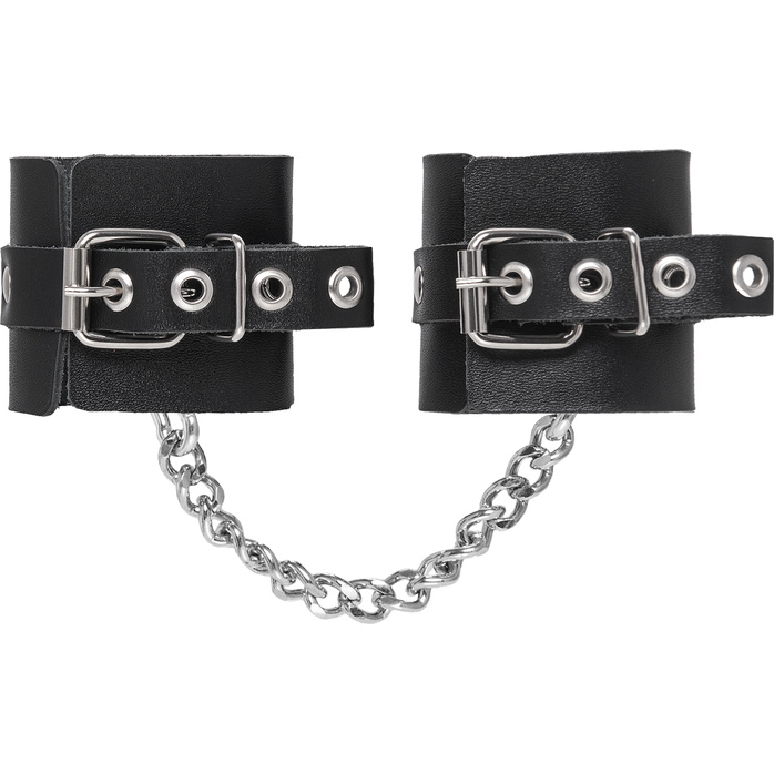 Черные наручники из толстой натуральной кожи с люверсами. Фотография 4.