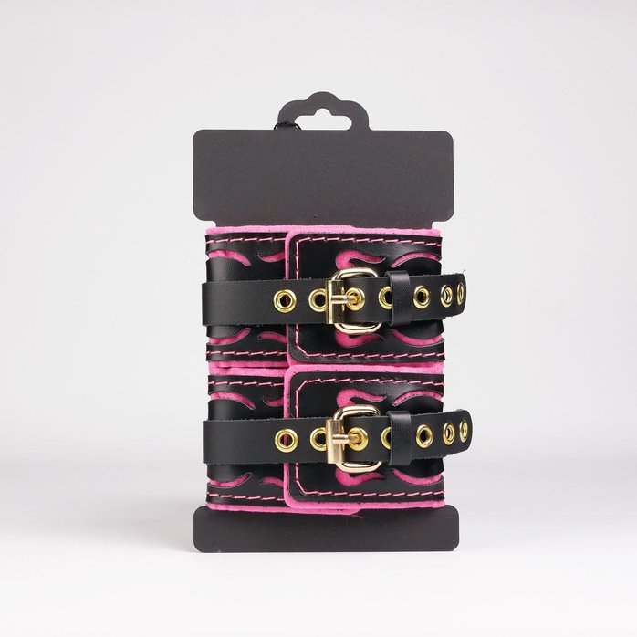 Черные кожаные оковы с розовой строчкой. Фотография 3.