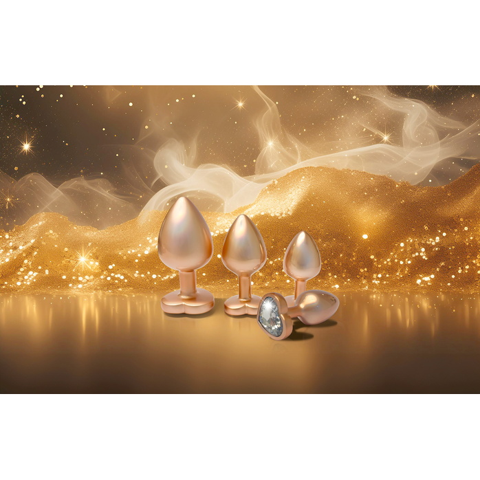 Золотистая анальная пробка с прозрачным кристаллом-сердцем Pearl Gold Plug Small - Gleaming Love. Фотография 4.