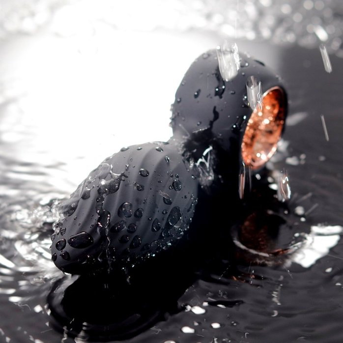 Черная анальная пробка с вибрацией, вращением и пультом ДУ. Фотография 5.