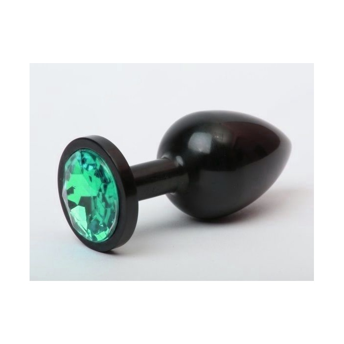 Чёрная анальная пробка с зелёным стразом - 7,6 см