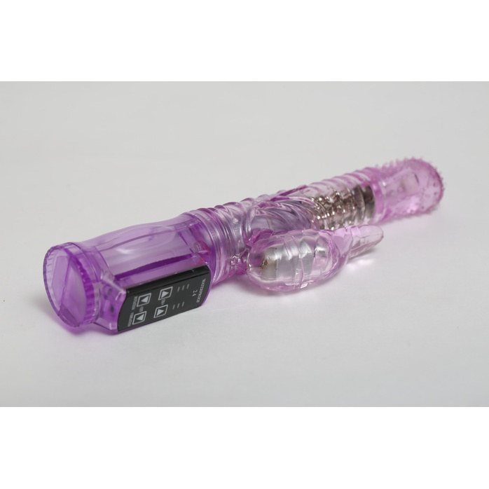 Фиолетовый силиконовый вибратор с подвижной головкой в пупырышках - 21 см. Фотография 2.
