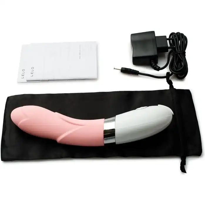 Розовый, украшенный лепестками вибратор Iris Pink - 22 см. Фотография 4.