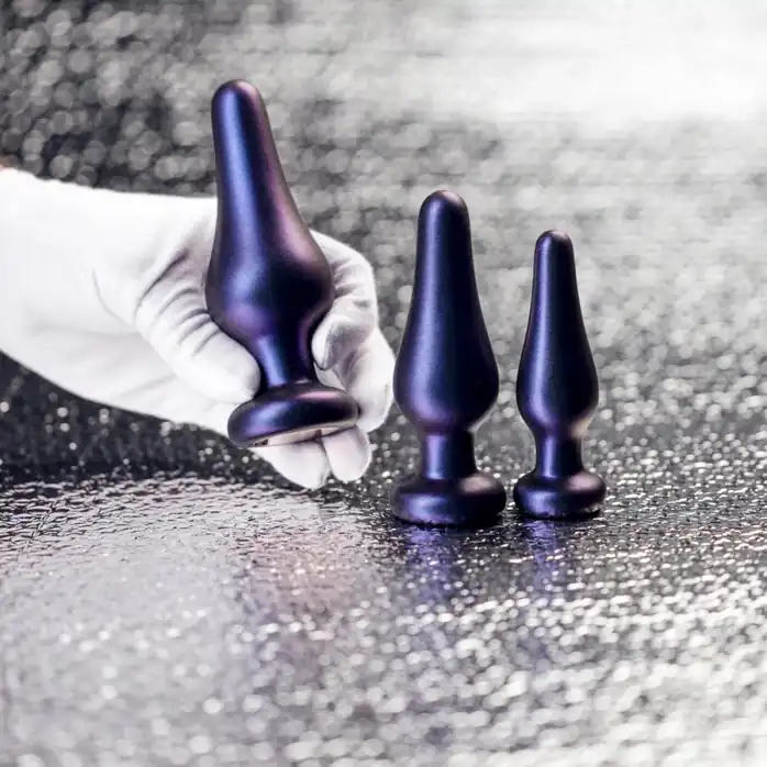 Набор из 3 фиолетовых анальных пробок Comets Butt Plug Set - Hueman. Фотография 4.