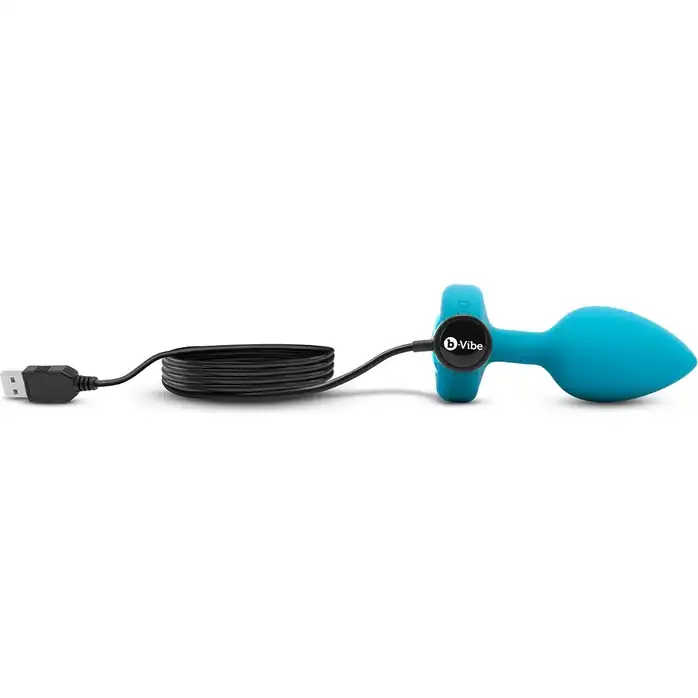 Бирюзовая анальная вибровтулка с кристаллом Vibrating Jewel Plug S/M - 10 см. Фотография 4.