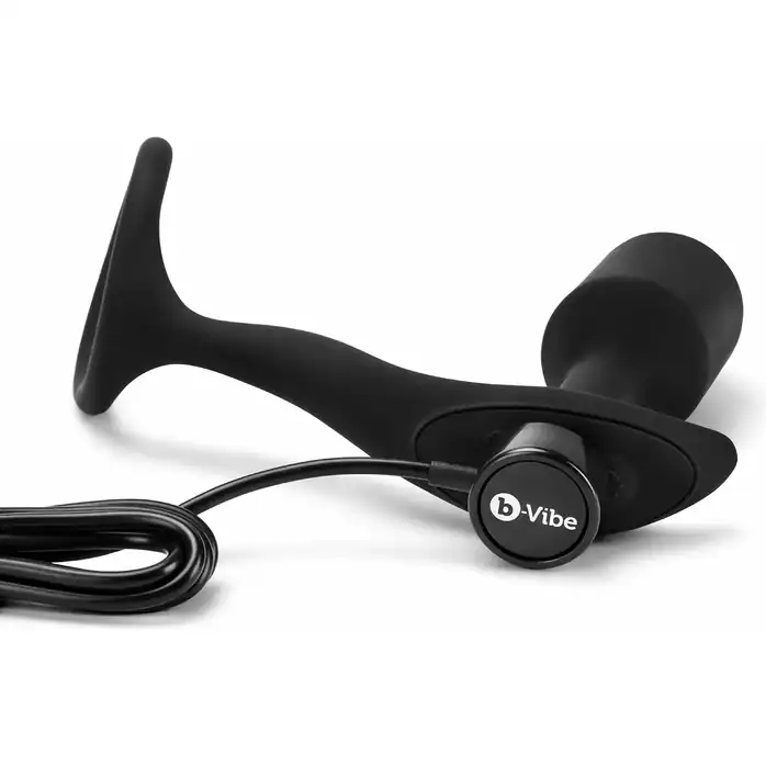 Черная анальная вибропробка с эрекционным кольцом Vibrating Snug Tug M. Фотография 3.