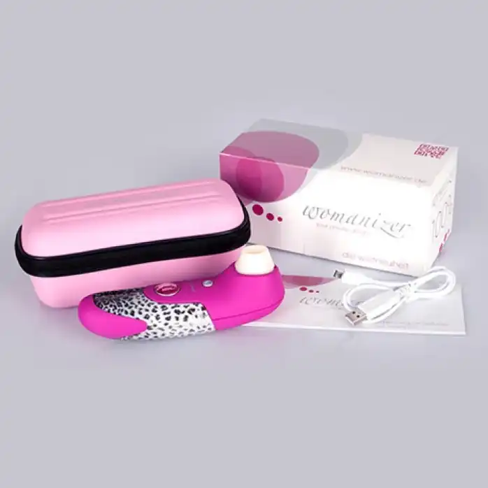 Лиловый бесконтактный стимулятор клитора WOMANIZER magenta. Фотография 3.