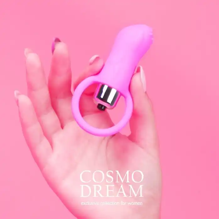 Розовый вибромассажер с рельефной поверхностью и петелькой - COSMO DREAM. Фотография 6.