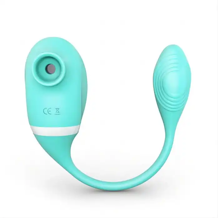 Мятный вакуумный вибростимулятор Tadpole Vibrating Dual Stimulation с виброхвостиком. Фотография 4.